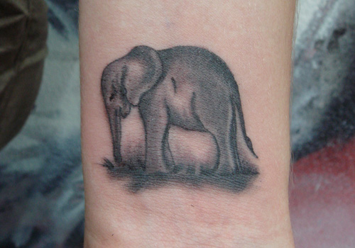 Black And Grey Elephant Tattoo Design For Wrist