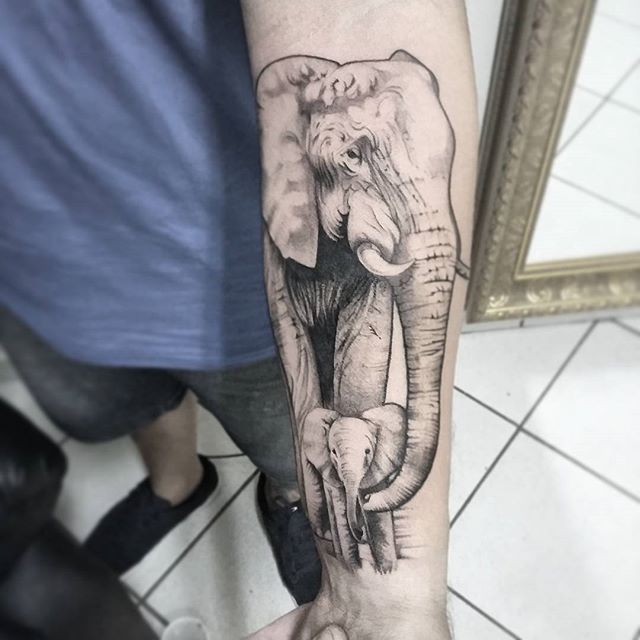 Black And Grey Elephant With Baby Elephant Tattoo On Forearm