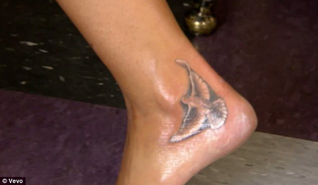 Black And Grey Flying Bird Ankle Tattoo