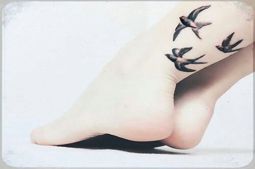 Black And Grey Flying Birds Tattoo On Left Leg
