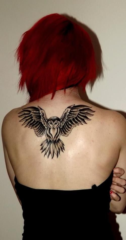 Black And Grey Flying Owl Tattoo On Girl Upper Back