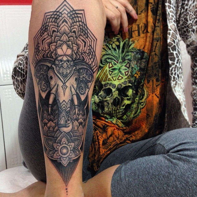 Black And Grey Indian Elephant With Flowers Tattoo On Right Leg