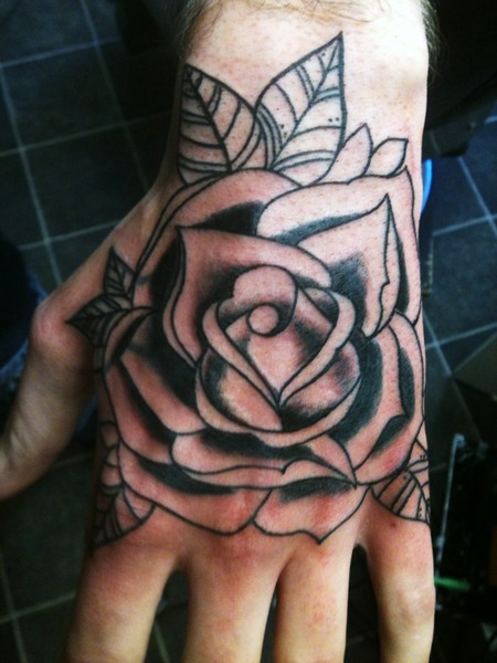 Black And Grey Rose Flower Hand Tattoo