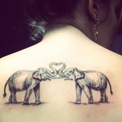 Black And Grey Two Elephant Tattoo On Upper Back