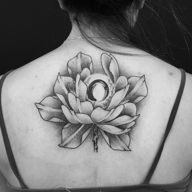 Black And Grey Zen Lotus Tattoo On Girl Upper Back
