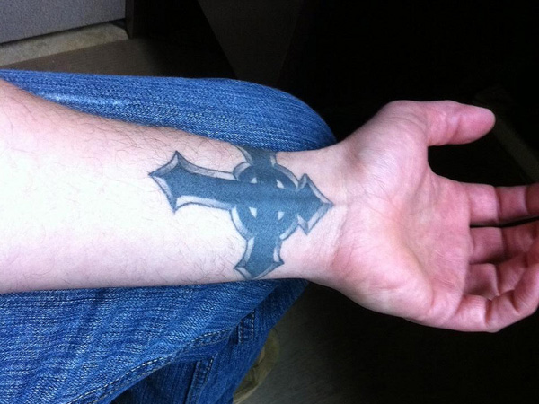 Black Cross Tattoo On Left Wrist For Men