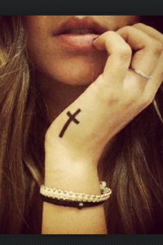 Black Cross Tattoo On Side Hand