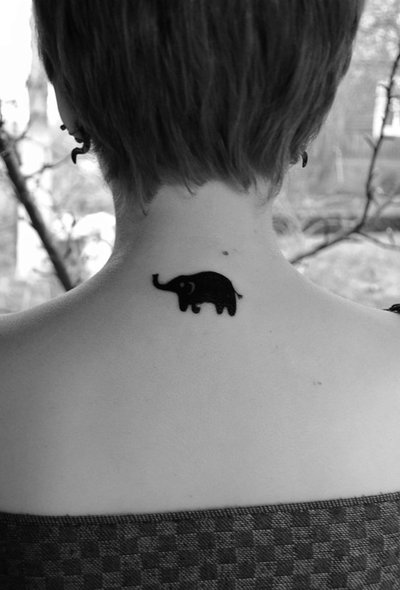 Black Elephant Trunk Up Tattoo On Girl Upper Back