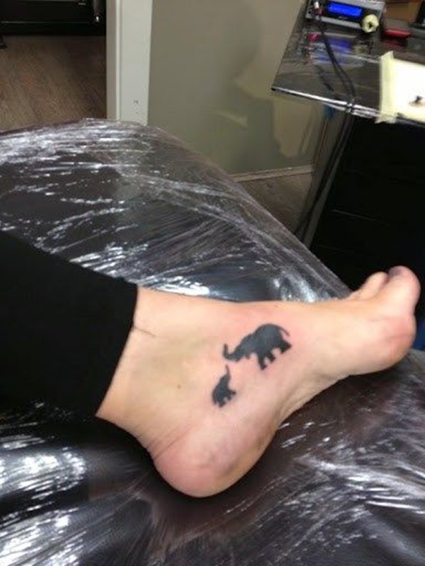 Black Elephant With Baby Elephant Tattoo On Ankle