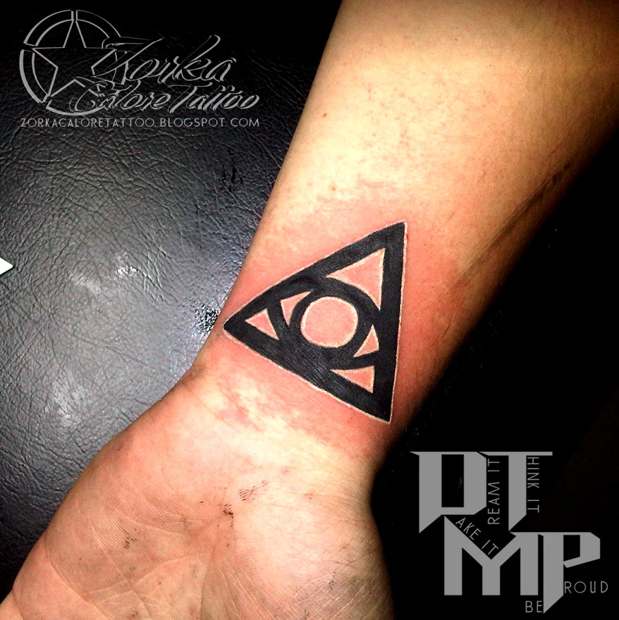 Black Eye In Triangle Tattoo On Wrist By Zorka Calore