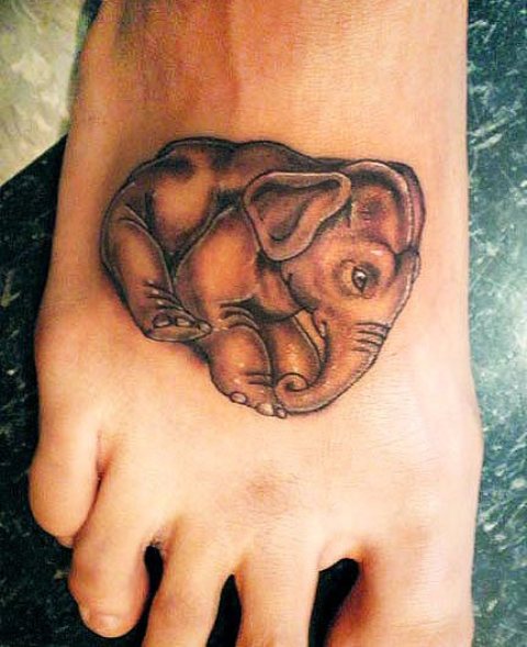 Black Ink Baby Elephant Tattoo On Right Foot