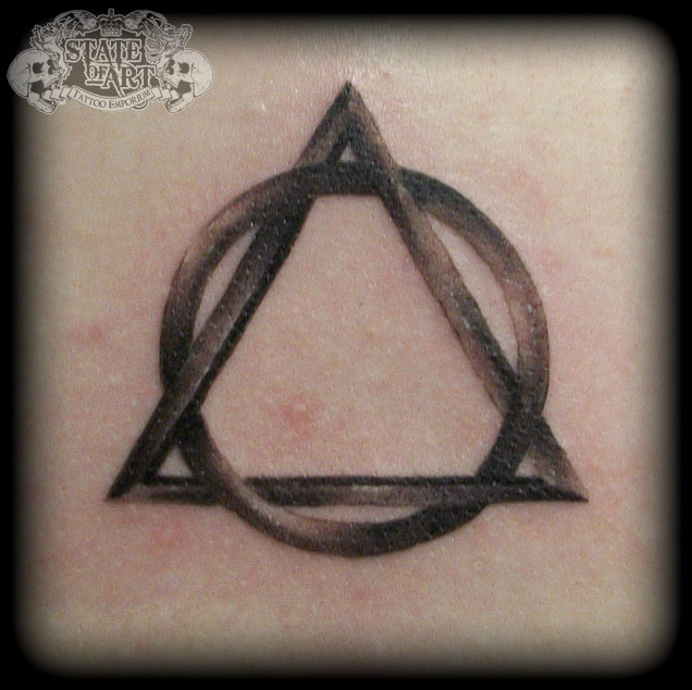 Black Ink Circle In Triangle Tattoo Design