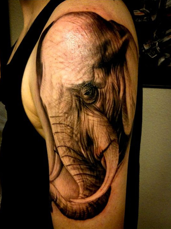 Black Ink Elephant Head Tattoo On Left Half Sleeve