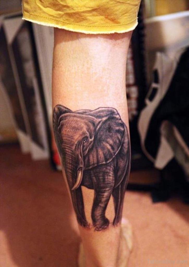Black Ink Elephant Tattoo Design For Leg Calf