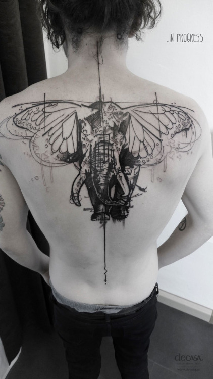 Black Ink Elephant With Butterfly Wings Ears Tattoo On Upper Back