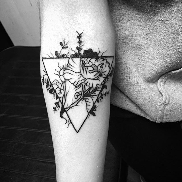 Black Ink Flower In Triangle Tattoo On Right Forearm