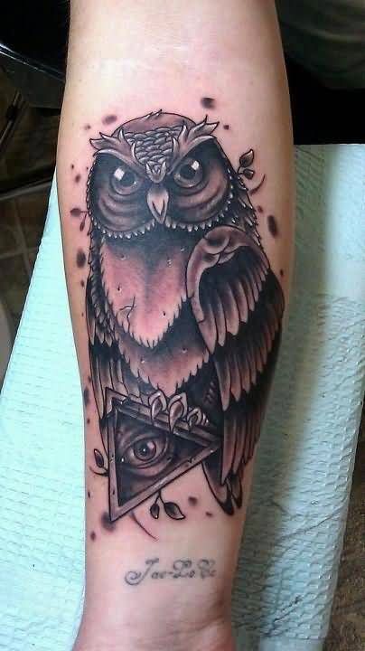 Black Ink Owl With Triangle Eye Tattoo Design For Forearm