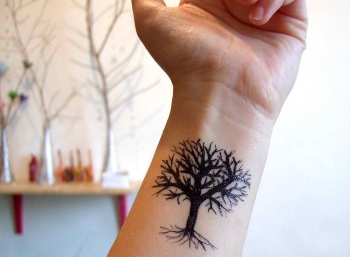 Black Ink Tree Tattoo On Left Wrist For Men