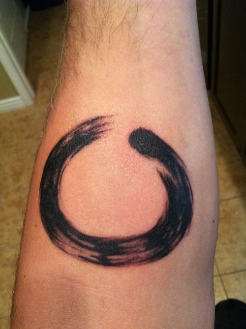 Black Ink Zen Enso Circle Tattoo On Forearm
