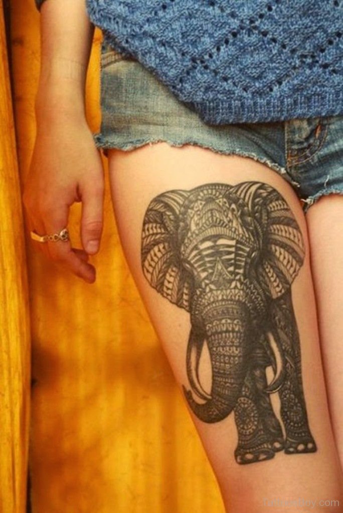 Black Maori Elephant Tattoo On Girl Right Thigh