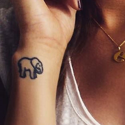 Black Outline Elephant Tattoo On Girl Right Side Wrist