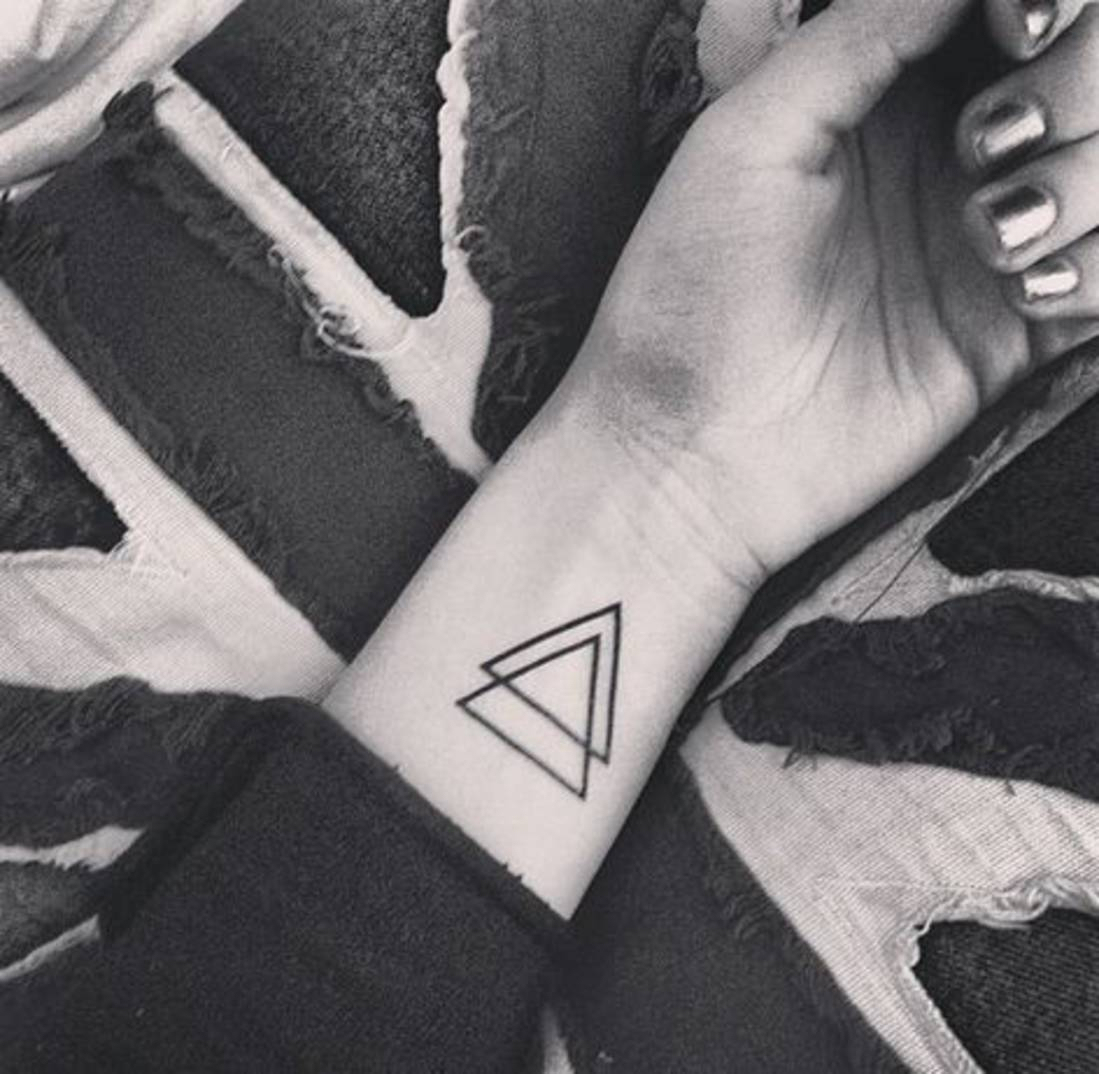 Black Outline Triangle Tattoo On Girl Left Forearm