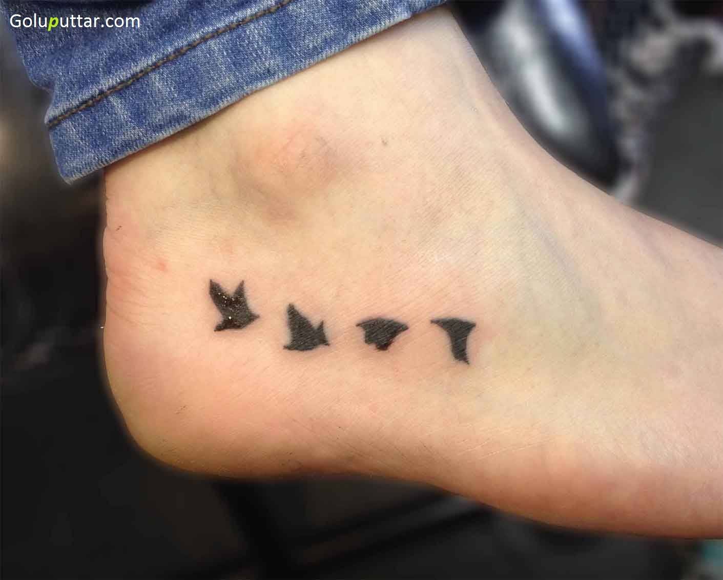 Black Silhouette Flying Birds Ankle Tattoo