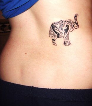 Black Tribal Elephant Trunk Up Tattoo Design For Lower Back
