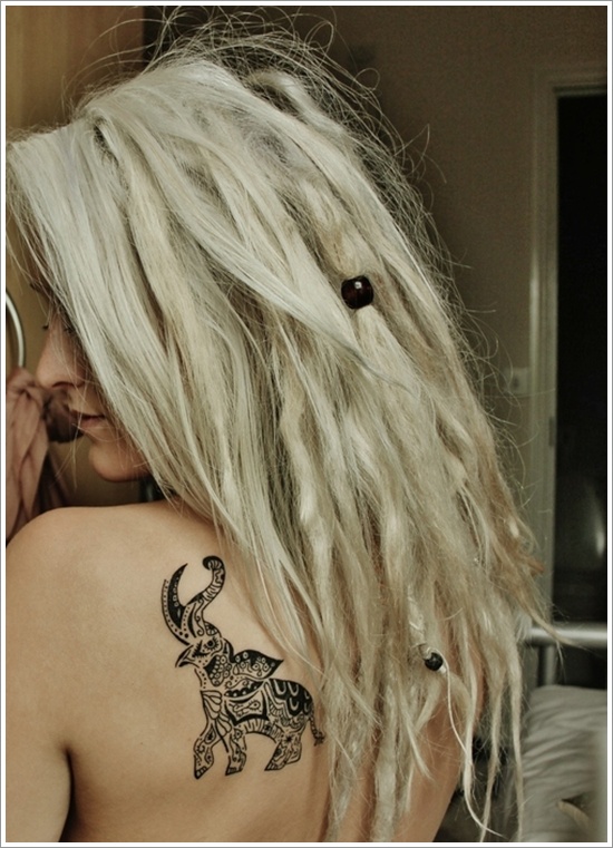 Black Tribal Elephant Trunk Up Tattoo On Girl Left Back Shoulder
