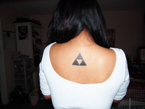 Black Triforce Triangle Tattoo On Girl Upper Back