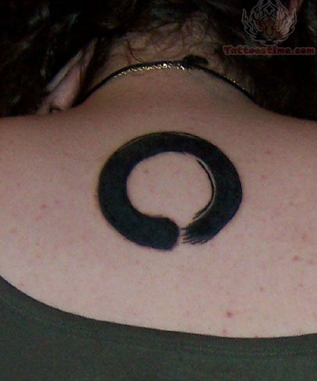 Black Zen Circle Tattoo On Girl Upper Back