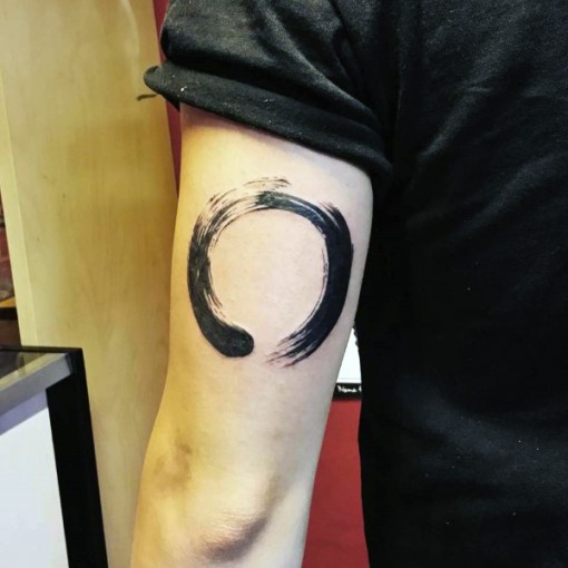 Black Zen Circle Tattoo On Left Half Sleeve