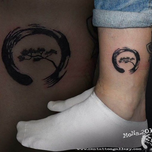 Black Zen Circle Tattoo On Left Leg
