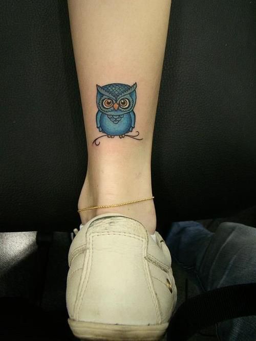 Blue Baby Owl Tattoo On Girl Back Leg