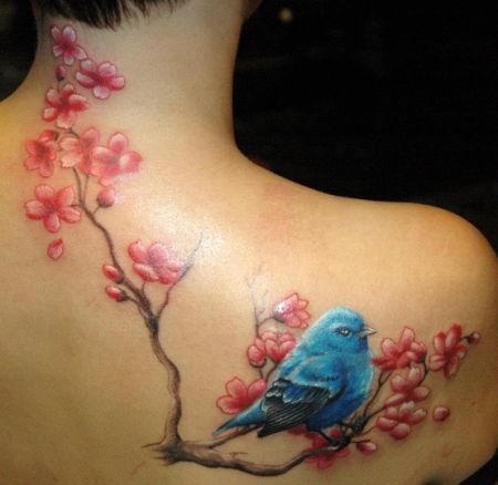 Blue Ink Bird And Cherry Blossom Flowers Tattoo