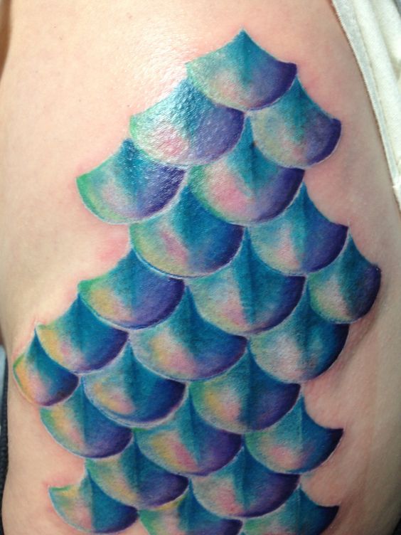Blue Ink Mermaid Scale Tattoo On Shoulder