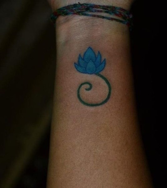 Blue Lotus Flower Tattoo On Girl Left Wrist