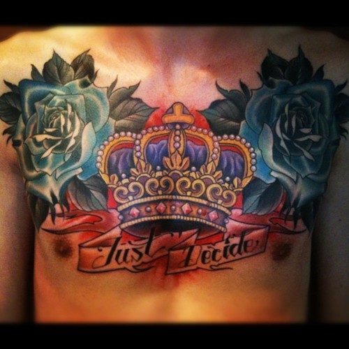 Blue Rose Flowers And Crown Tattoo On Chest