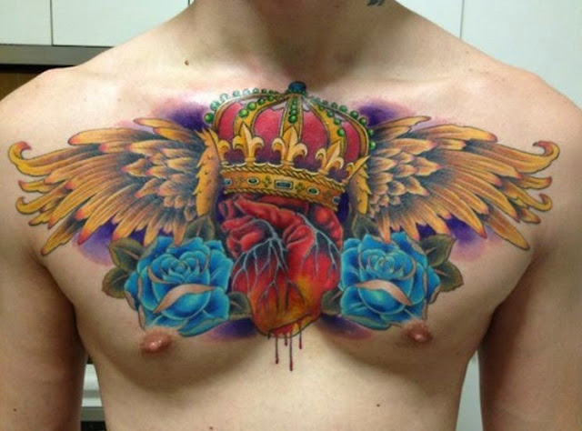 Blue Rose Flowers And Crown Tattoo On Man Chest