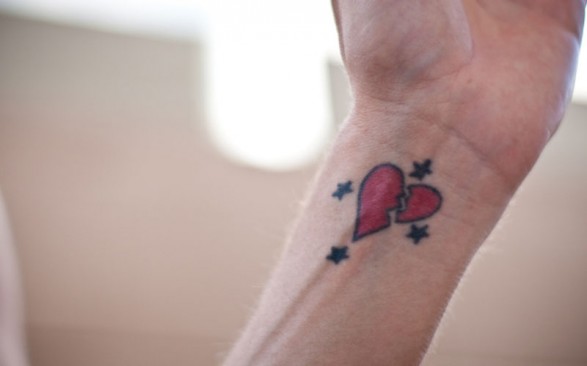 Broken Heart And Star Tattoos On Wrist For Men