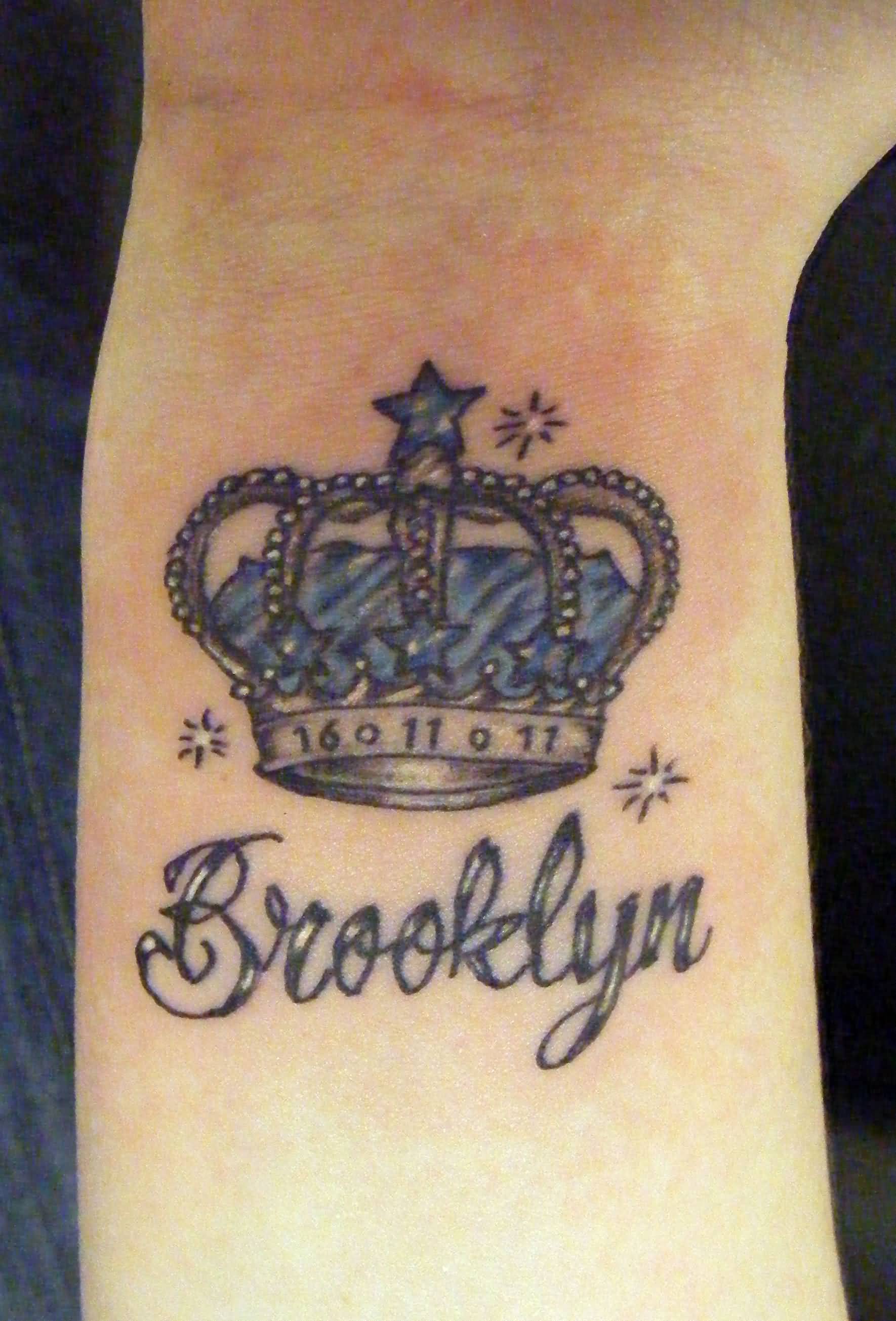 Brooklyn Crown Tattoo On Right Wrist