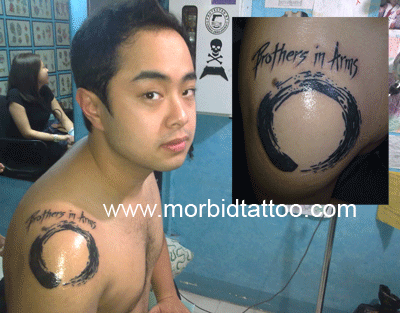 Brothers In Arms - Black Ink Zen Enso Circle Tattoo On Man Right Shoulder
