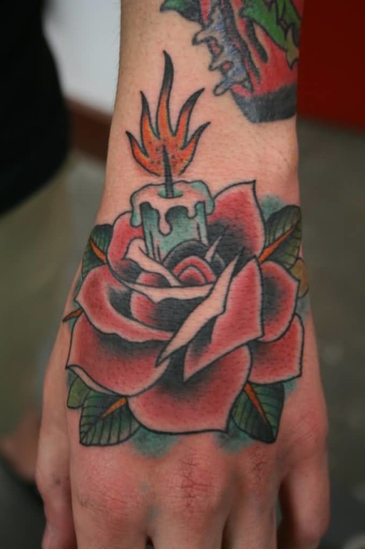 Burning Candle In Rose Hand Tattoo For Women