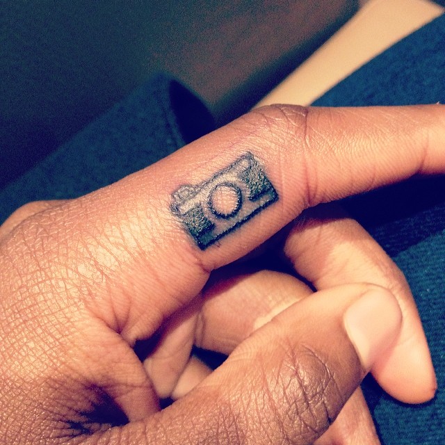 Camera Tattoo On Side Finger