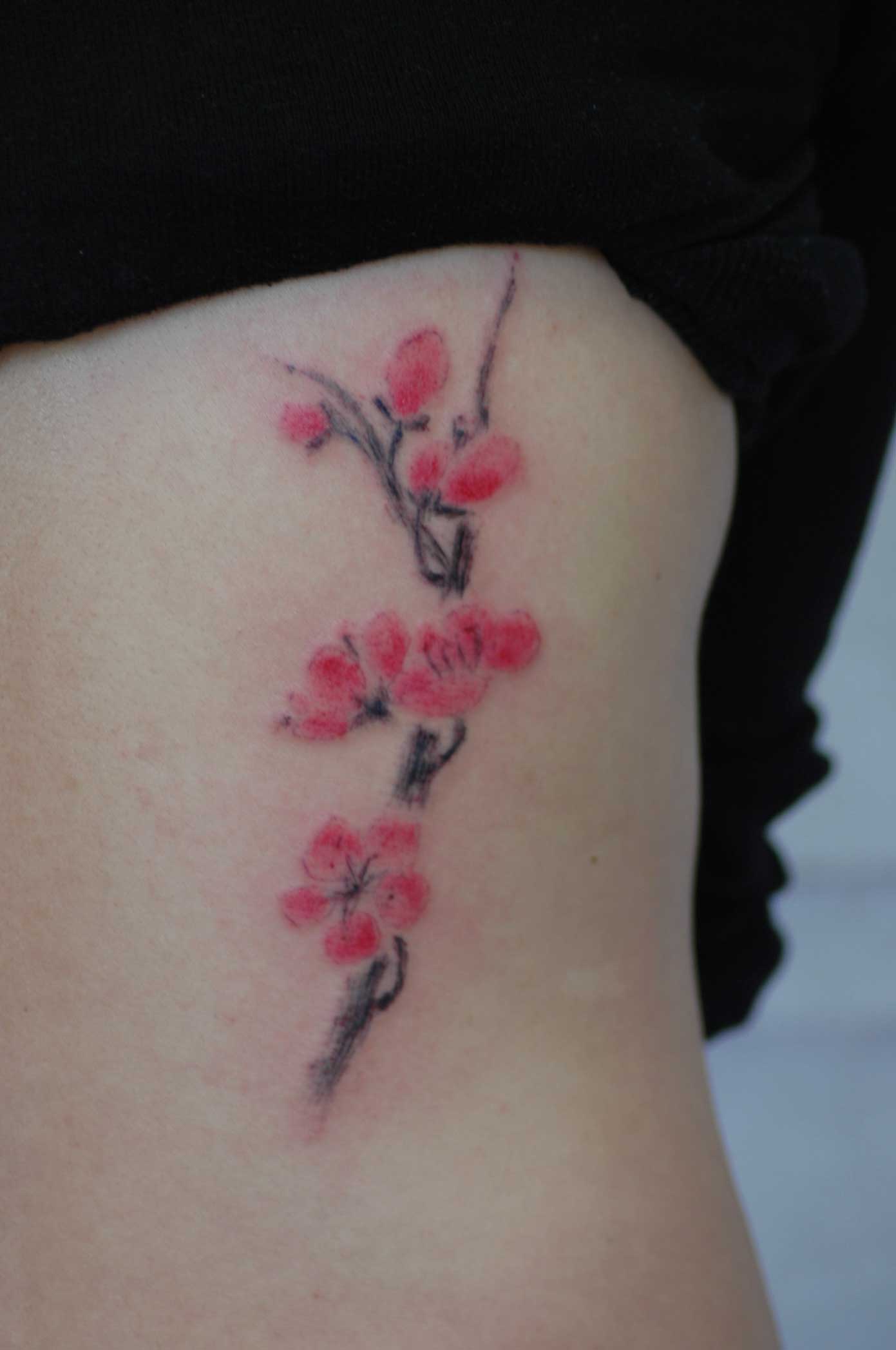 Cherry Blossom Tattoo On Girl Rib Side