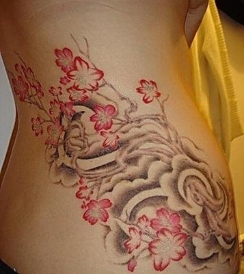 Cherry Blossom Tattoo On Girl Side Rib