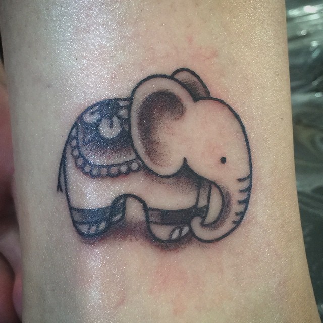 Classic Black Ink Baby Elephant Tattoo Design
