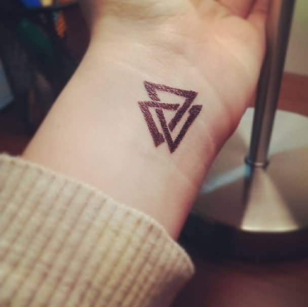 Classic Black Triangle Tattoo On Wrist By Emily