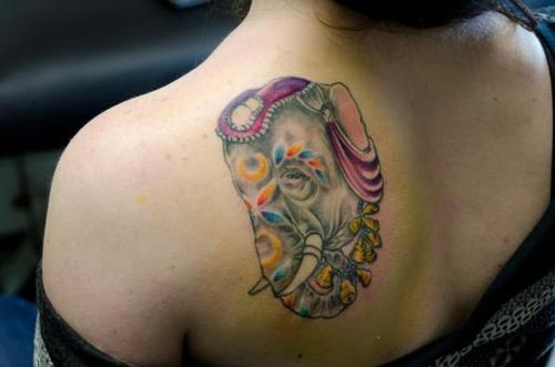 Colorful Chinese Elephant Head Tattoo On Girl Left Back Shoulder