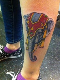Colorful Circus Elephant Head Tattoo On Left Leg